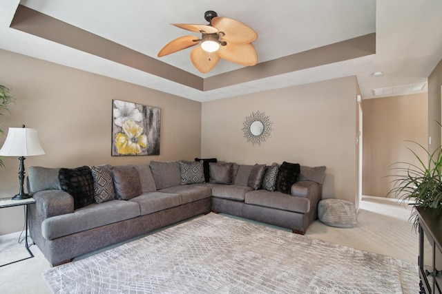 12103 Via San Rocco Ct, Cypress, TX 77429 - carpeted living area with a ceiling fan and a raised ceiling