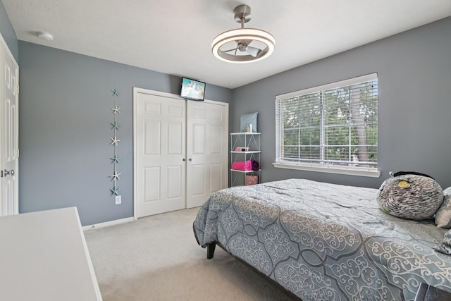 12103 Via San Rocco Ct, Cypress, TX 77429 - carpeted bedroom with a closet and baseboards
