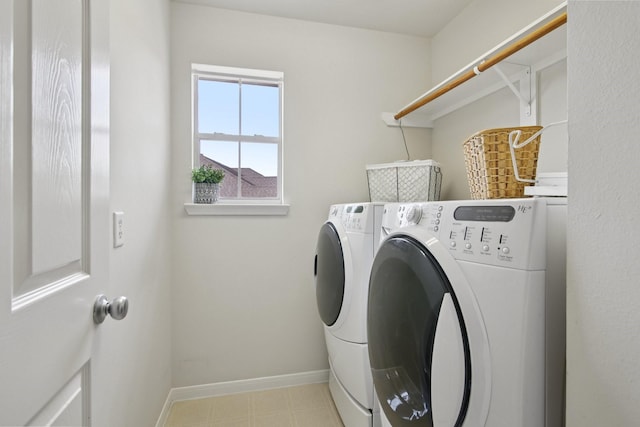 12103 Via San Rocco Ct, Cypress, TX 77429 - washroom featuring independent washer and dryer and baseboards