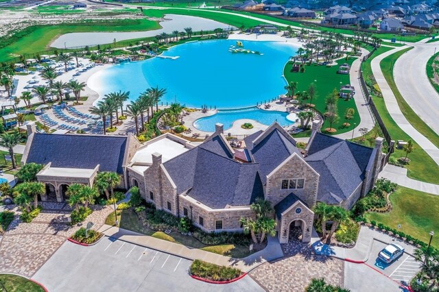 12831 Raemoir Dr, Humble, TX 77346 - bird's eye view of a pool and a large body of water