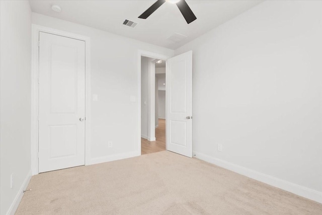 12831 Raemoir Dr, Humble, TX 77346 - unfurnished bedroom with carpet floors and a ceiling fan
