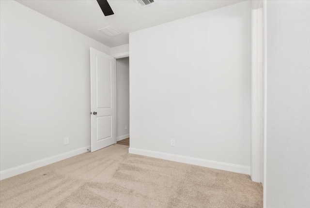 12831 Raemoir Dr, Humble, TX 77346 - spare room featuring light colored carpet and a ceiling fan
