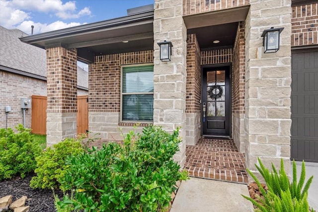 12831 Raemoir Dr, Humble, TX 77346 - doorway to property featuring brick siding and stone siding