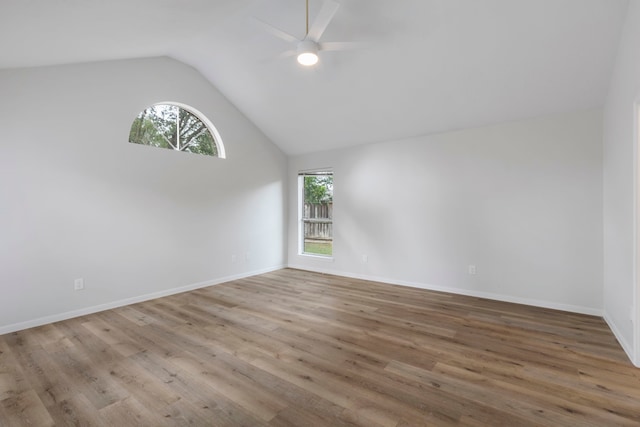 1815 Moston Dr, Spring, TX 77386 - unfurnished room featuring ceiling fan, lofted ceiling, and wood finished floors