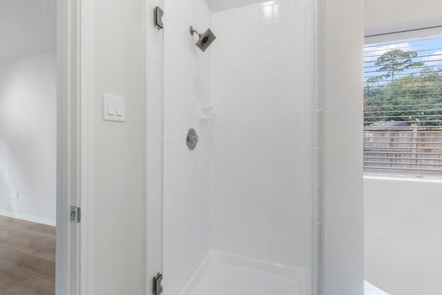 1815 Moston Dr, Spring, TX 77386 - full bath with a shower stall and wood finished floors