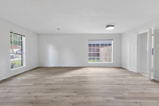 1815 Moston Dr, Spring, TX 77386 - unfurnished room featuring light wood-style floors and baseboards