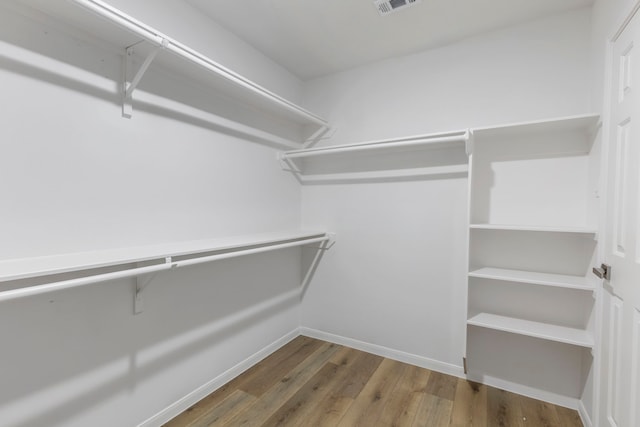 1815 Moston Dr, Spring, TX 77386 - spacious closet with wood finished floors