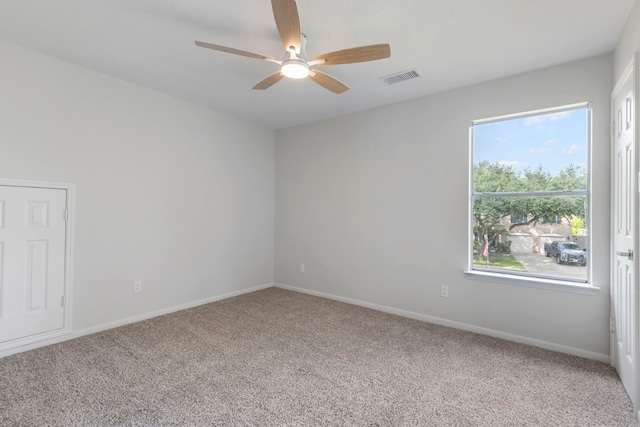 1815 Moston Dr, Spring, TX 77386 - unfurnished room with a ceiling fan and carpet floors