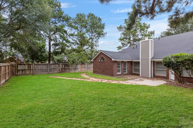 1815 Moston Dr, Spring, TX 77386 - fenced backyard featuring a patio area