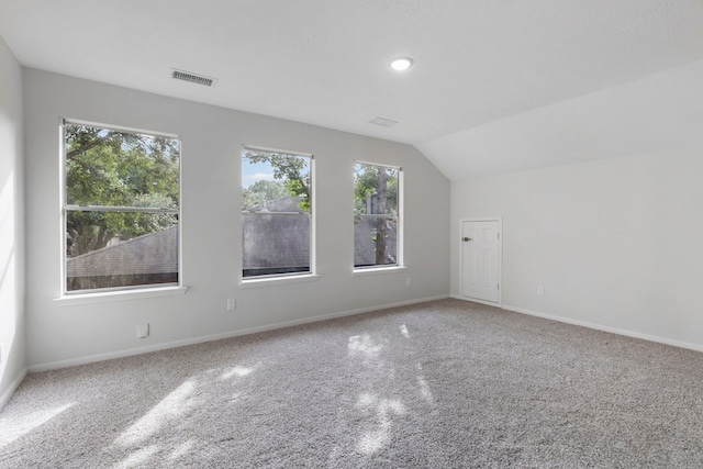 1815 Moston Dr, Spring, TX 77386 - additional living space featuring carpet floors, healthy amount of natural light, recessed lighting, and lofted ceiling