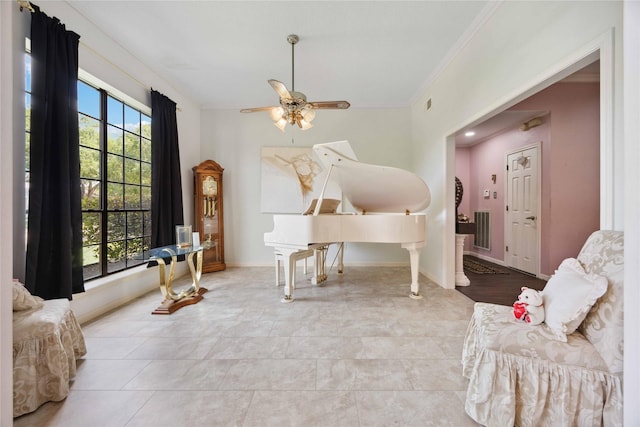 2701 11th St N, Texas City, TX 77590 - sitting room with ornamental molding and a ceiling fan