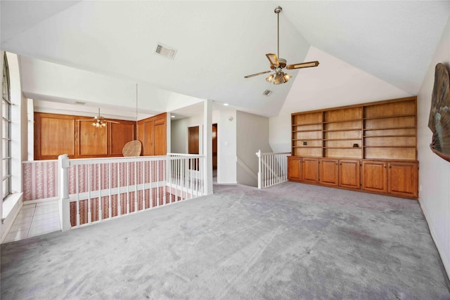2701 11th St N, Texas City, TX 77590 - spare room with ceiling fan, light colored carpet, and high vaulted ceiling