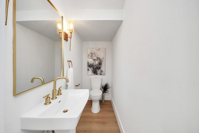 4415 Coke St Unit B, Houston, TX 77020 - bathroom featuring a sink and wood finished floors