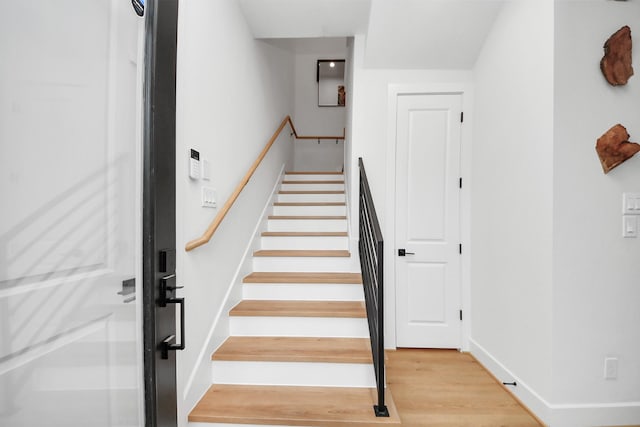 4415 Coke St Unit B, Houston, TX 77020 - staircase featuring wood finished floors and baseboards