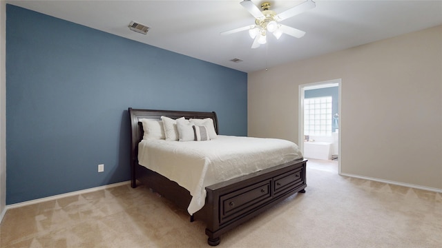 18118 Castle Rain Dr, Humble, TX 77346 - bedroom with light carpet and ceiling fan