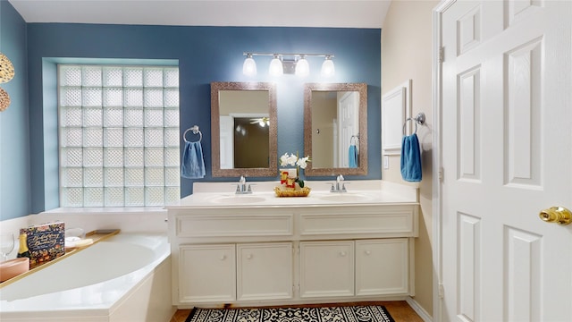 18118 Castle Rain Dr, Humble, TX 77346 - full bath with double vanity and a bath