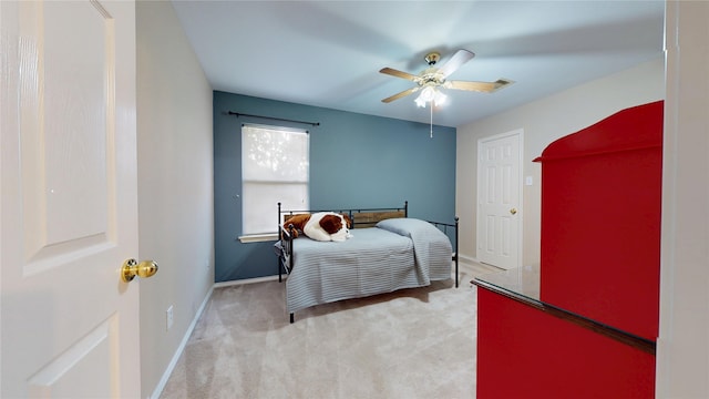 18118 Castle Rain Dr, Humble, TX 77346 - carpeted bedroom with baseboards and a ceiling fan