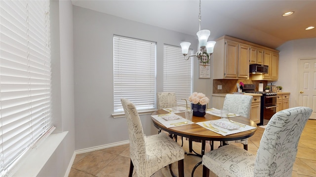 18118 Castle Rain Dr, Humble, TX 77346 - dining space with a chandelier, light tile patterned floors, and recessed lighting