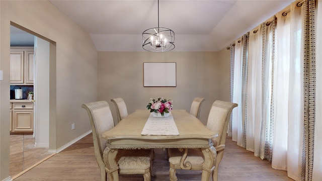 18118 Castle Rain Dr, Humble, TX 77346 - dining area with a chandelier and light wood finished floors