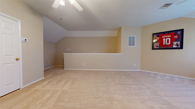 18118 Castle Rain Dr, Humble, TX 77346 - bonus room with vaulted ceiling, a ceiling fan, and light carpet