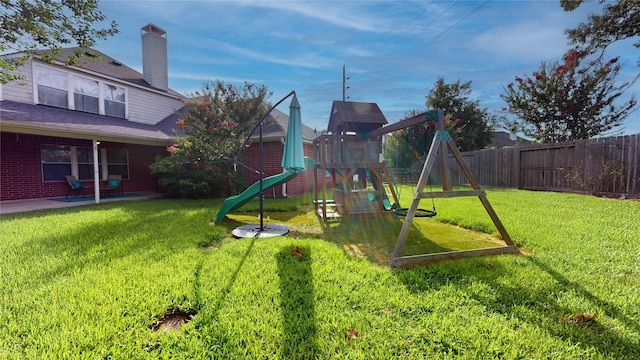 18118 Castle Rain Dr, Humble, TX 77346 - view of jungle gym with a fenced backyard and a patio area