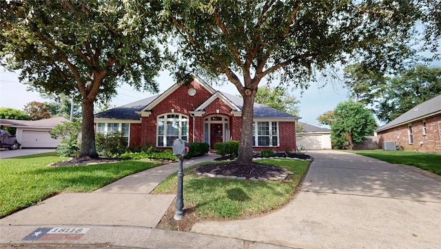 18118 Castle Rain Dr, Humble, TX 77346 - view of front facade featuring brick siding and a front yard