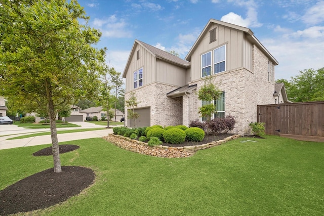 16630 Polletts Cove Ct, Humble, TX 77346 - view of property exterior with board and batten siding, brick siding, concrete driveway, and a garage