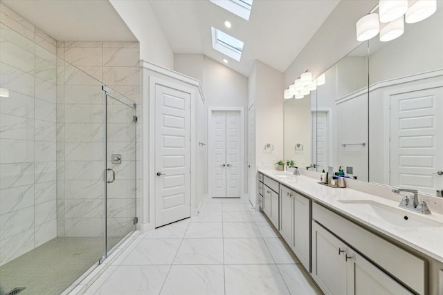 16630 Polletts Cove Ct, Humble, TX 77346 - full bath with a skylight, double vanity, marble finish floors, a shower stall, and lofted ceiling