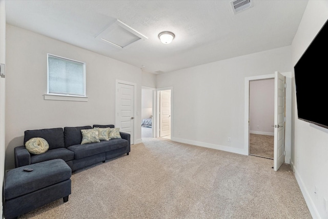 16630 Polletts Cove Ct, Humble, TX 77346 - living room featuring attic access and light carpet