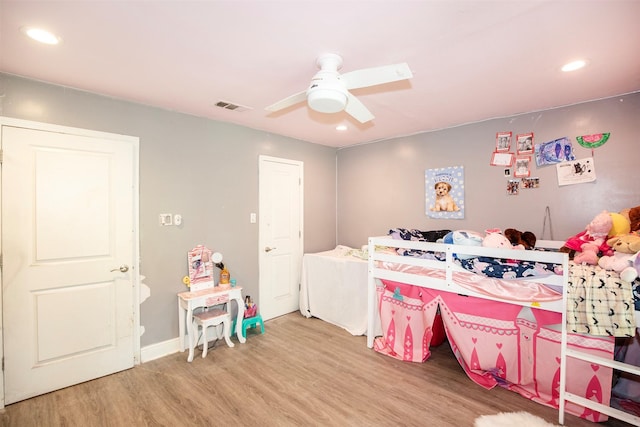 6203 Wickwillow Ln, Alvin, TX 77511 - bedroom with light wood-type flooring, recessed lighting, and a ceiling fan