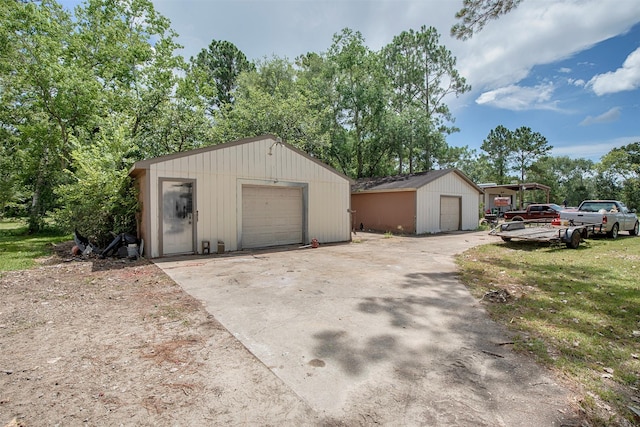 6203 Wickwillow Ln, Alvin, TX 77511 - detached garage with view of wooded area