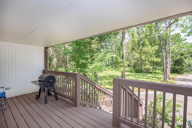 6203 Wickwillow Ln, Alvin, TX 77511 - wooden deck with a grill and a lawn
