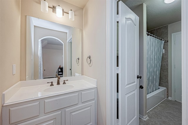16011 Maple Shores Dr, Houston, TX 77044 - full bath featuring vanity, tile patterned floors, and shower / tub combo with curtain