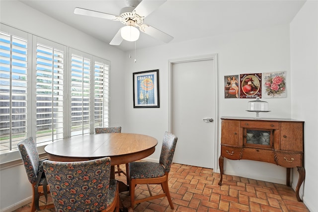 2618 Fontana Dr, Houston, TX 77043 - dining space with ceiling fan and brick flooring