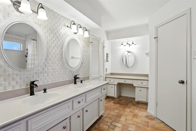 2618 Fontana Dr, Houston, TX 77043 - bathroom with double vanity, backsplash, and brick flooring