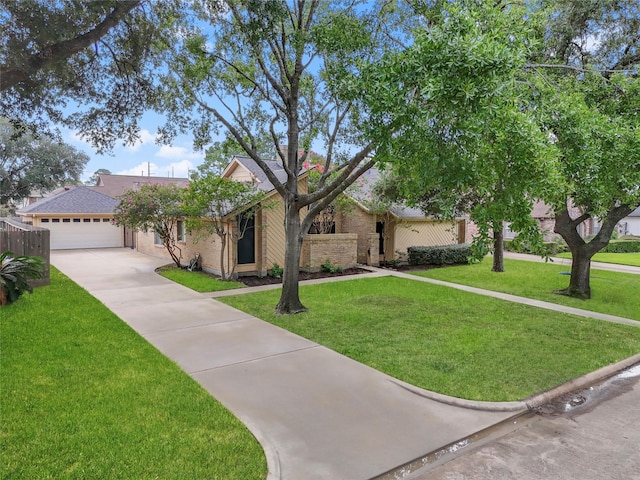 2618 Fontana Dr, Houston, TX 77043 - view of front facade with an attached garage, concrete driveway, and brick siding