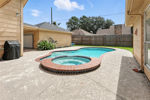 2618 Fontana Dr, Houston, TX 77043 - view of swimming pool with area for grilling, a fenced backyard, a patio, and a pool with connected hot tub