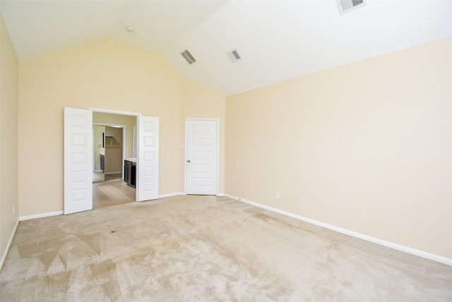 20315 Cypress Poll Dr, Cypress, TX 77433 - unfurnished bedroom featuring carpet, high vaulted ceiling, and connected bathroom