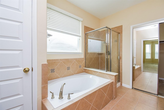 20315 Cypress Poll Dr, Cypress, TX 77433 - bathroom with a shower stall, a bath, tile patterned floors, and vanity