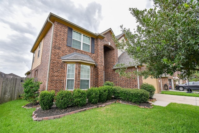 20315 Cypress Poll Dr, Cypress, TX 77433 - traditional-style home with brick siding, an attached garage, and concrete driveway