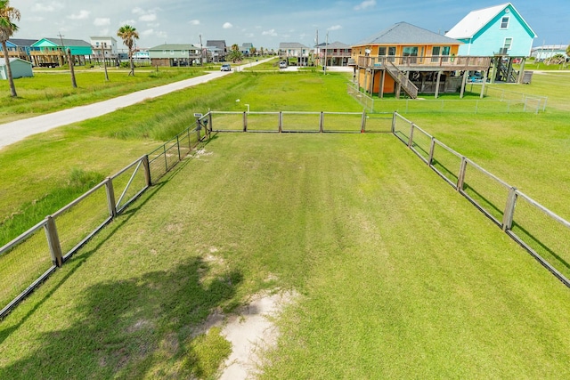 430 Jettyview Rd, Surfside Beach, TX 77541 - view of yard with a deck and stairs