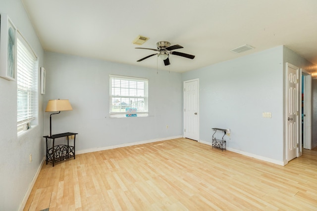 430 Jettyview Rd, Surfside Beach, TX 77541 - spare room featuring wood finished floors and a ceiling fan