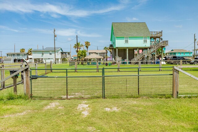 430 Jettyview Rd, Surfside Beach, TX 77541 - fenced backyard with stairs
