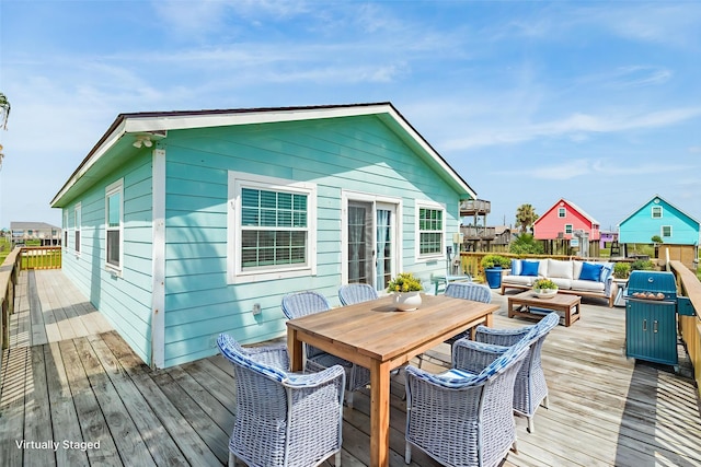 430 Jettyview Rd, Surfside Beach, TX 77541 - deck featuring an outdoor living space, outdoor dining area, and a grill
