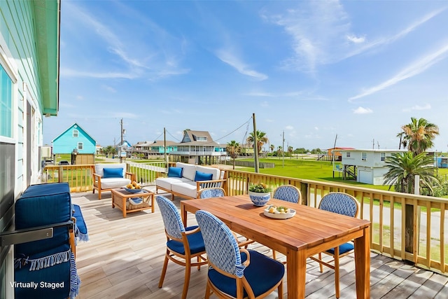 430 Jettyview Rd, Surfside Beach, TX 77541 - deck with a residential view, an outdoor hangout area, and outdoor dining area