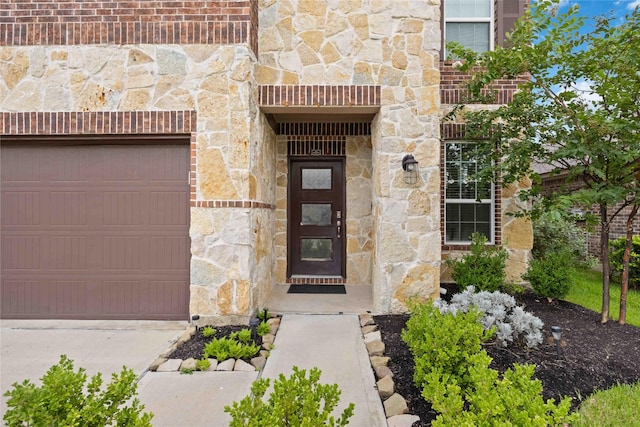 4427 Silvergrass Ln, Katy, TX 77493 - doorway to property featuring stone siding