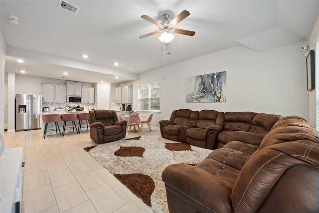 4427 Silvergrass Ln, Katy, TX 77493 - living room with ceiling fan and recessed lighting