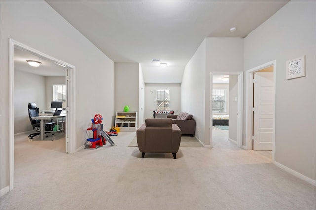4427 Silvergrass Ln, Katy, TX 77493 - hall with an office area, carpet floors, and plenty of natural light