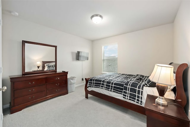 4427 Silvergrass Ln, Katy, TX 77493 - carpeted bedroom with baseboards
