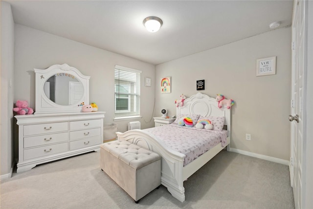 4427 Silvergrass Ln, Katy, TX 77493 - bedroom featuring light colored carpet and baseboards